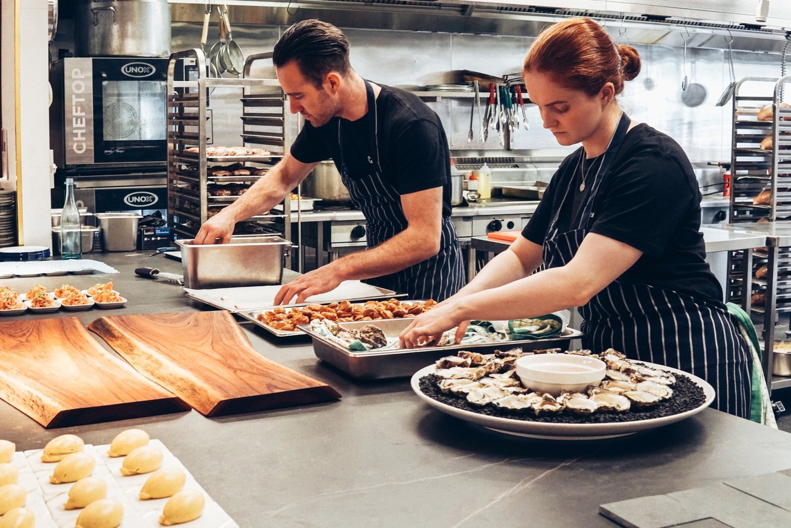Professional catering team working in a commercial kitchen